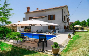 Beautiful home in Krsan with Outdoor swimming pool, Jacuzzi and 4 Bedrooms